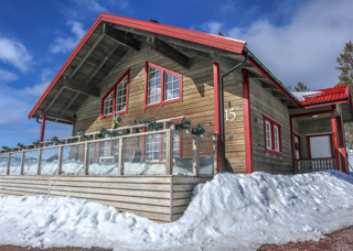 Stuga i vackert vinterlandskap i Toppbyn i Orsa Grönklitt